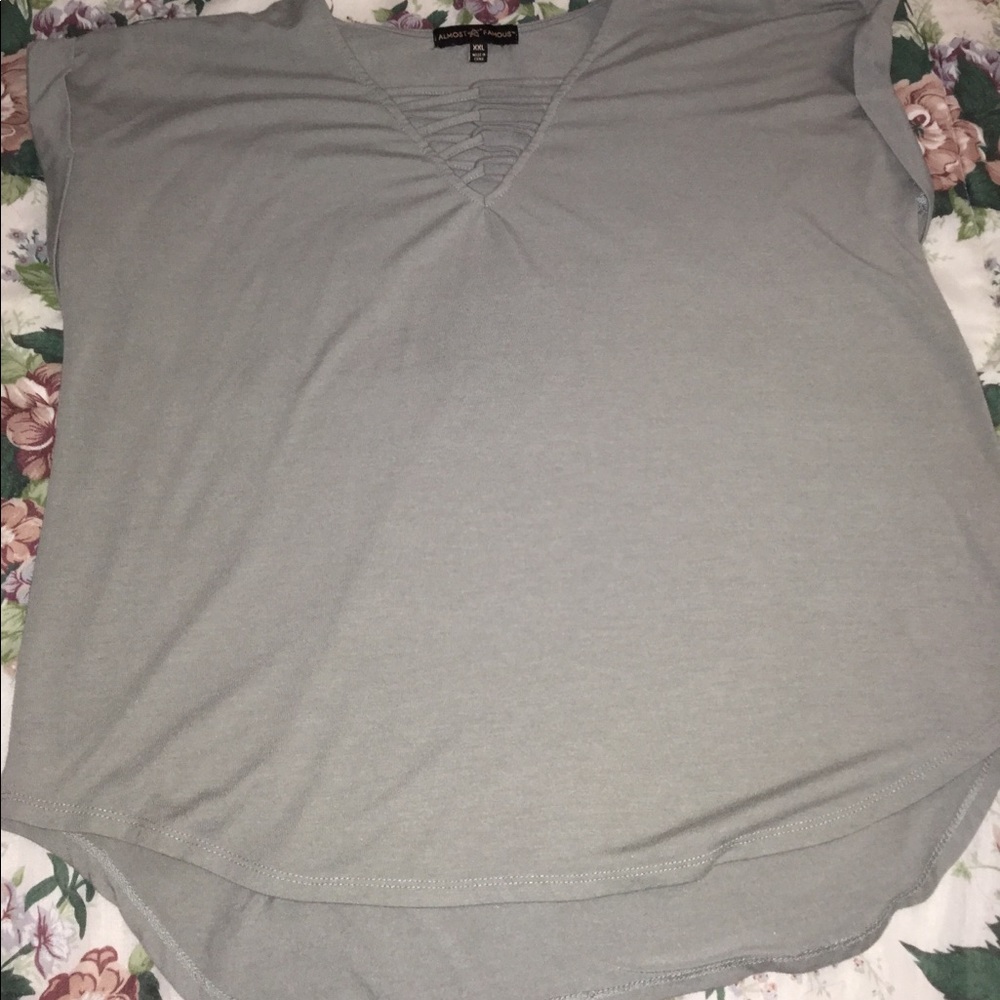 Cool-tone green top. XXL